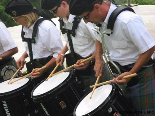 Close-up of snare drummers playing