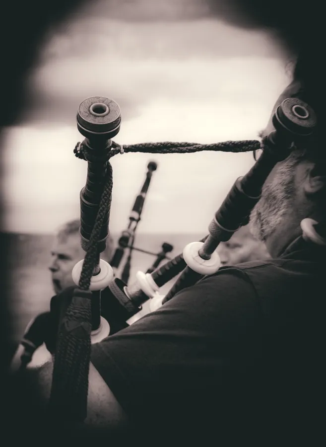 Black and white close-up of bagpipe drones