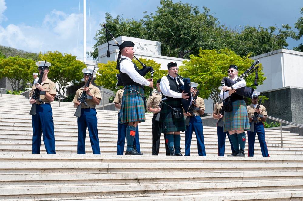 Isle of Maui Pipe Band pipers performing at the National Memorial Cemetery of the Pacific